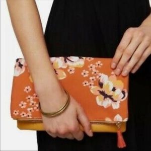 Reversible floral Rachel Pally zip clutch
